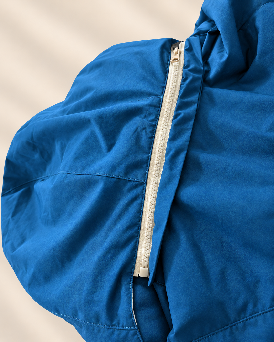 Detachable hoodie detail of a women fishing and boating jacket