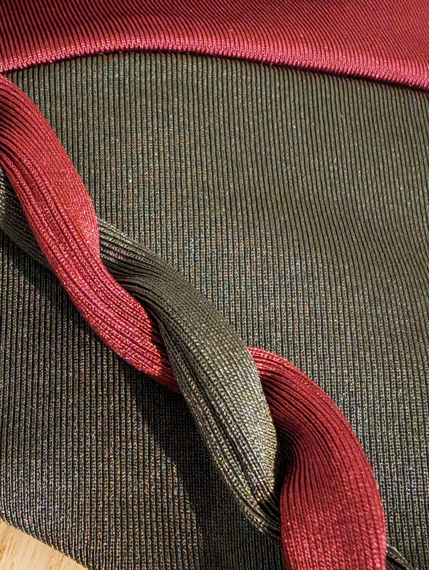 Close-up of the two-piece swimsuit’s braided tie on the olive color