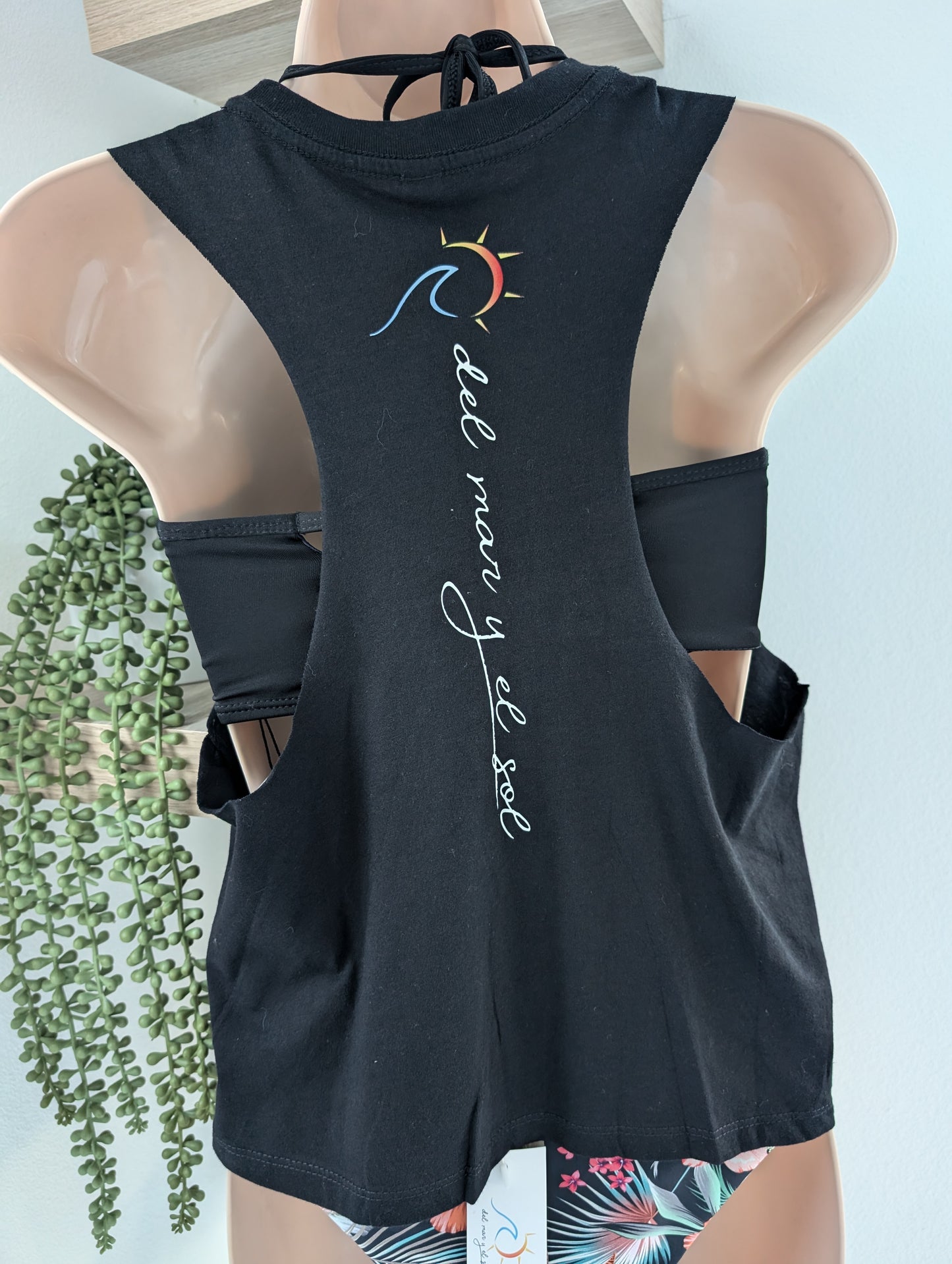 Black sleeveless tank top with the brand name and logo downwards