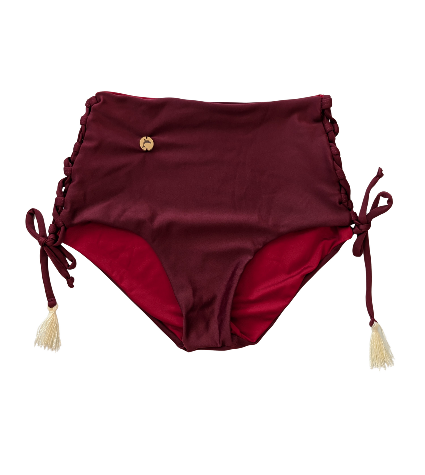High-waisted bikini bottom with lace-up sides and tassel details, handmade swimwear from Del Mar y el Sol