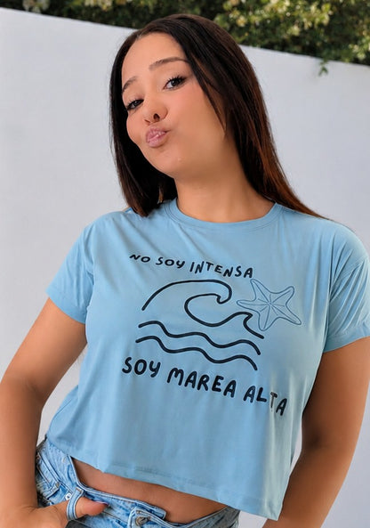 Light blue cropped graphic tee with nautical design by Del Mar y el Sol.