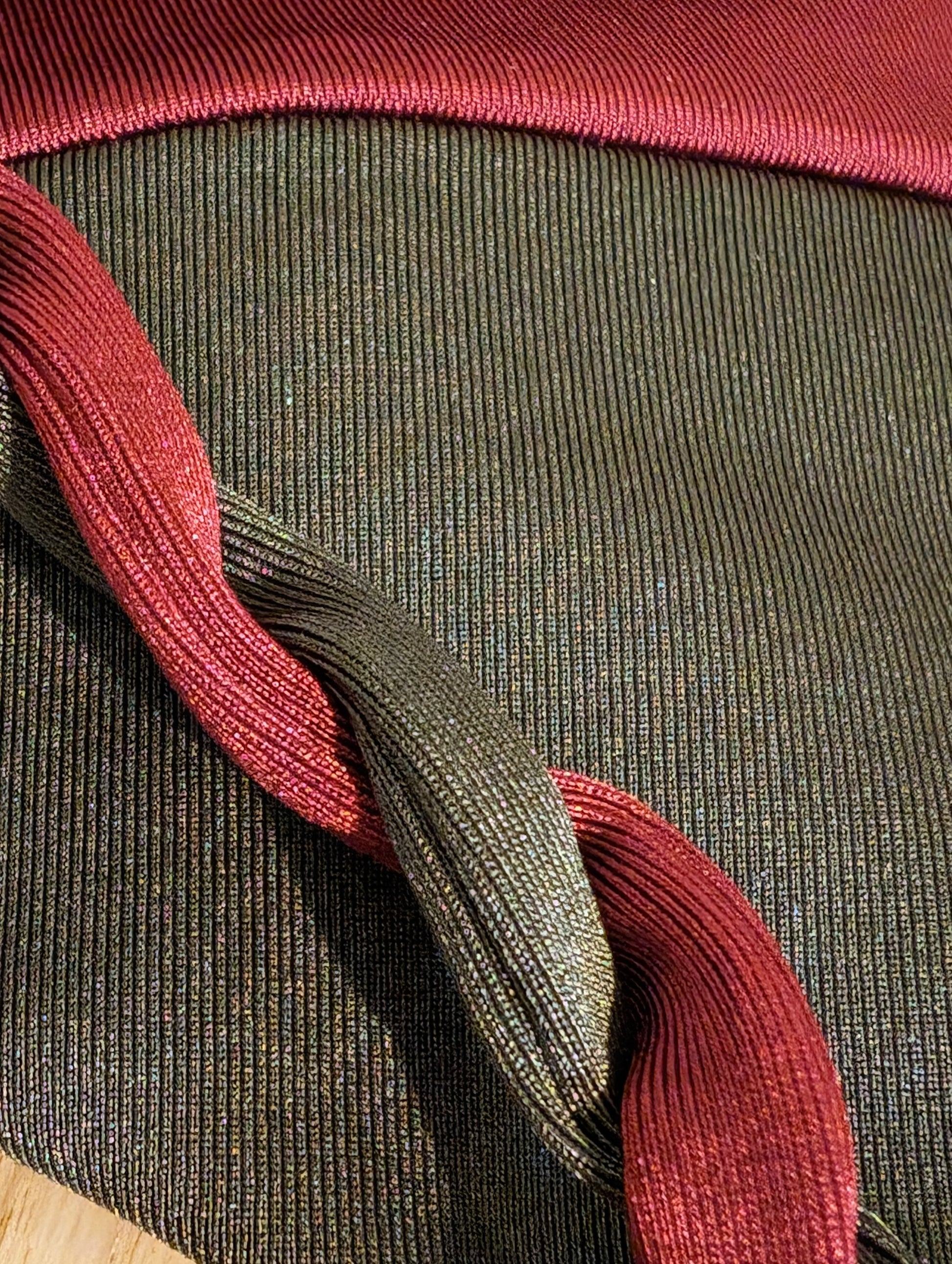 Close-up of the two-piece swimsuit’s braided tie on the olive color 