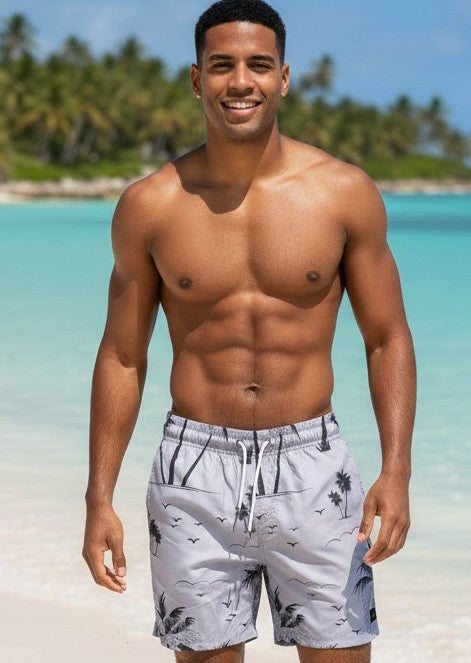 Men’s tropical beach shorts with palm tree inspired print and adjustable drawstring waistband