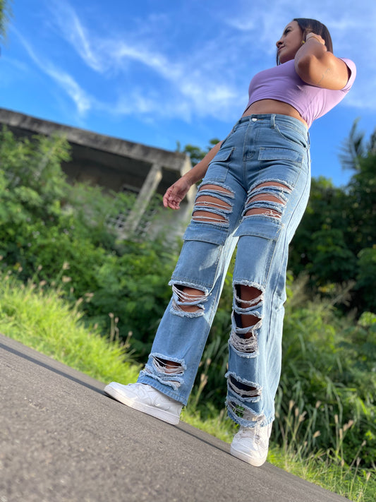 Women wearing ripped mom jeans casual coastal outfit street style
