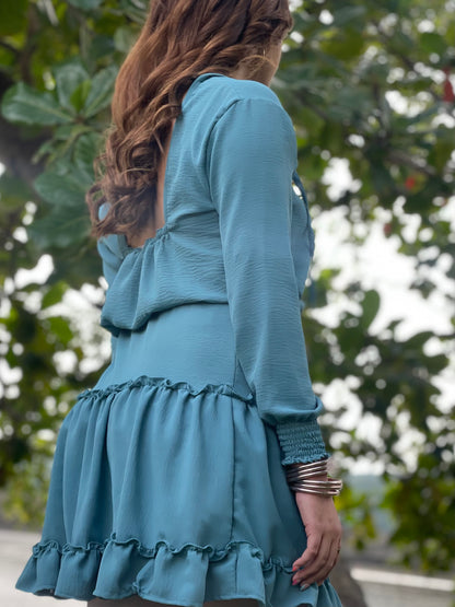 Elegant turquoise dress perfect for coastal chic style.